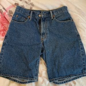 Levi’s mom shorts! High waisted and are pretty long! Fall right above the knee!